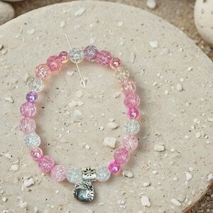 Hand Crafted Pink and Clear Beaded Bracelet with Silver Charm